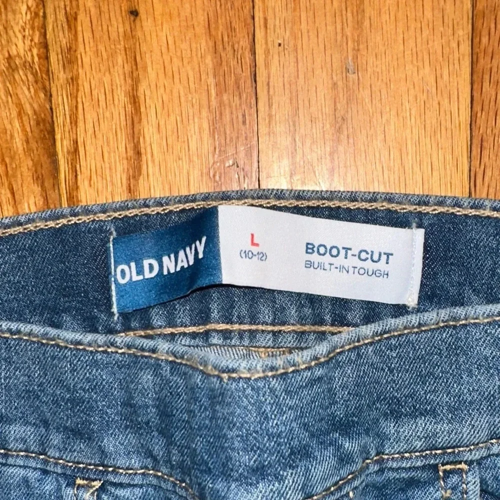 Old Navy girls pull on Slim Jeans in Light and Dark Blue